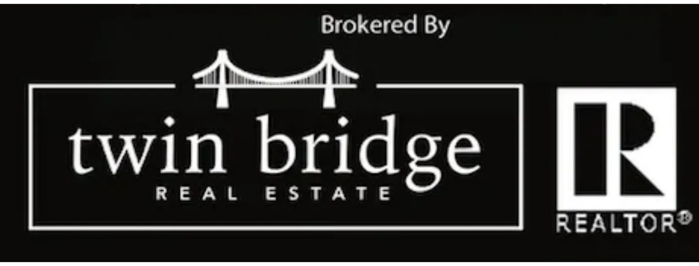 A black and white logo for an estate agent.